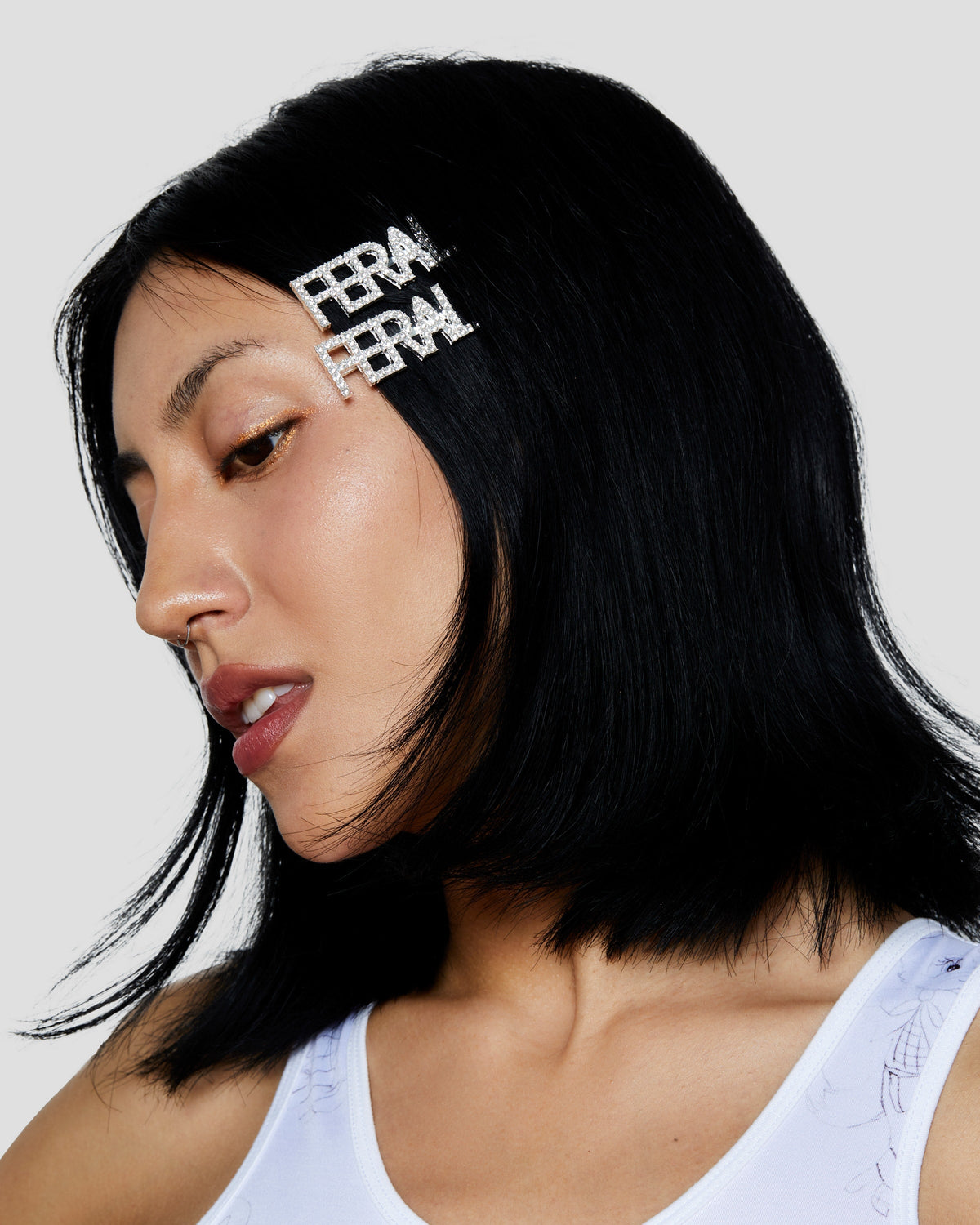 feral rhinestone clip
