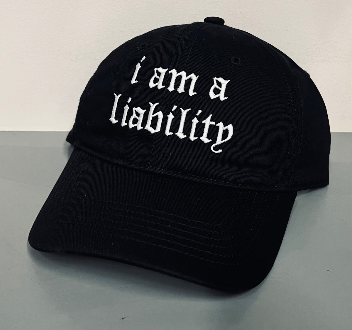 i am a liability - embroidered dad hat - READY TO SHIP