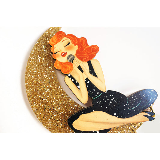 Singer sitting on the Moon Brooch by Laliblue