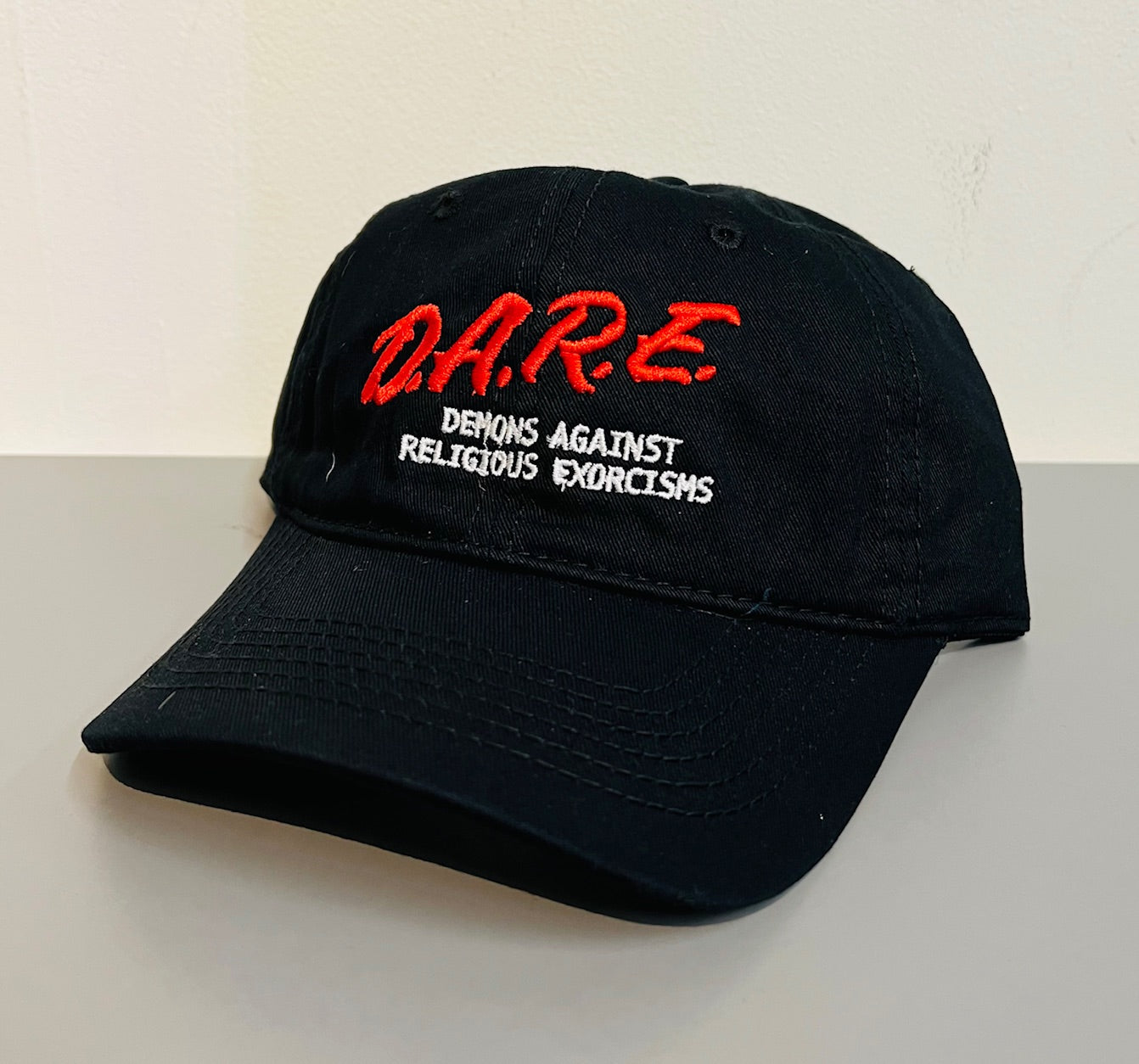 DARE demons against religious exorcisms -  Embroidered Dad Hat - READY TO SHIP