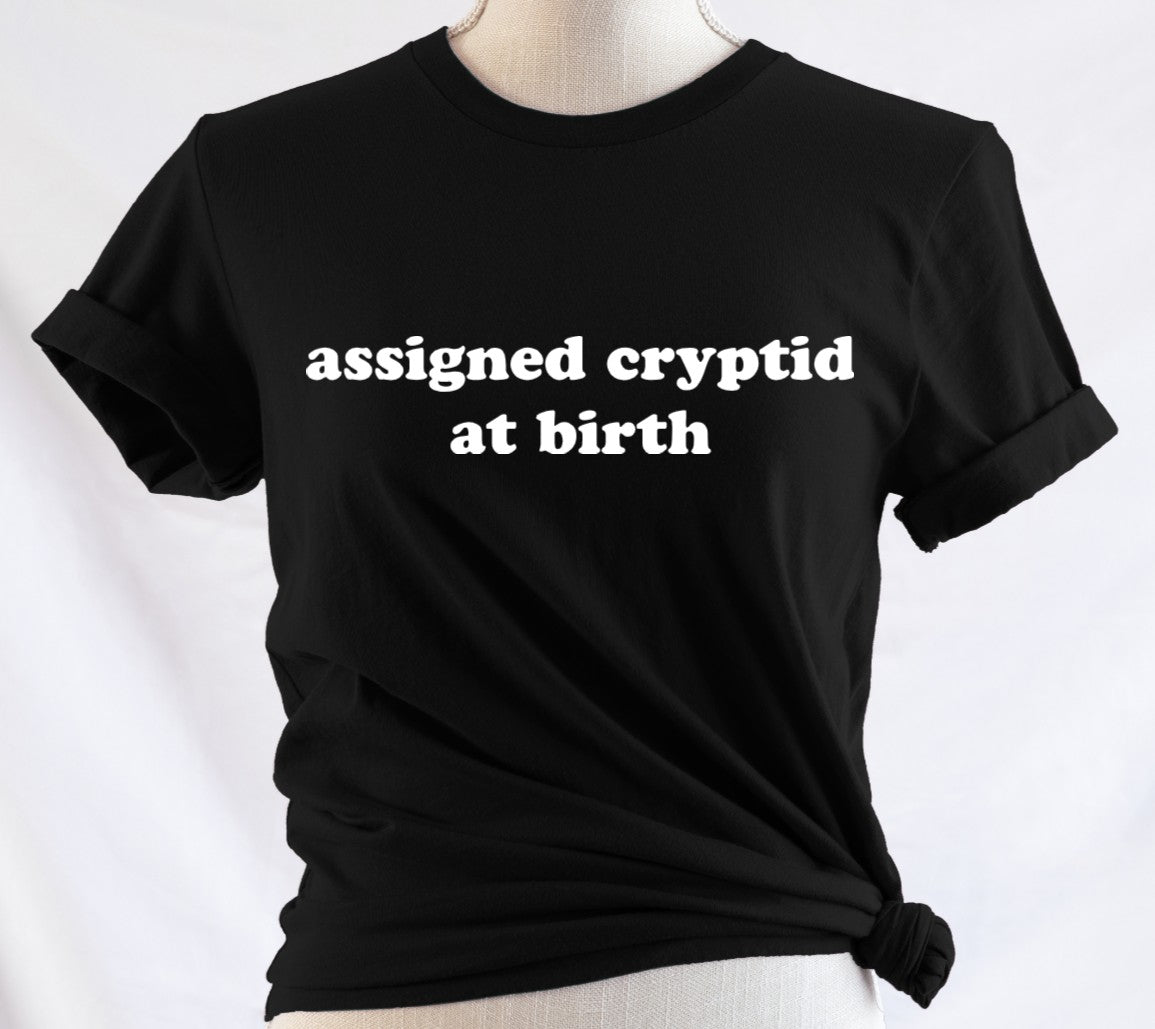 Assigned Cryptid at birth - Available in T-Shirt, Pullover, Hoodie, Tank or Long Sleeve