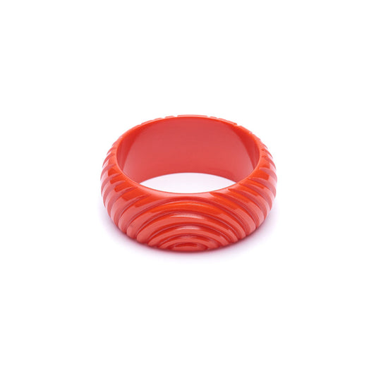 Wide Papaya Heavy Carve Fakelite Bangle by Splendette