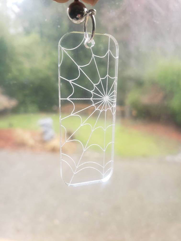 Transparent Web Dangle Studs